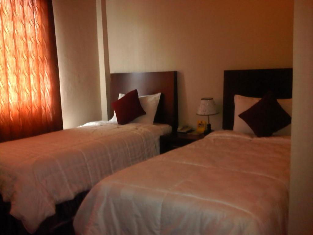 Grand Duta Hotel Palu Rom bilde