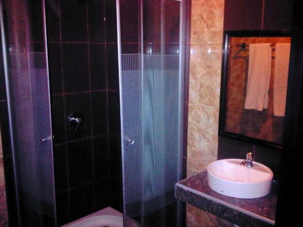 Grand Duta Hotel Palu Rom bilde