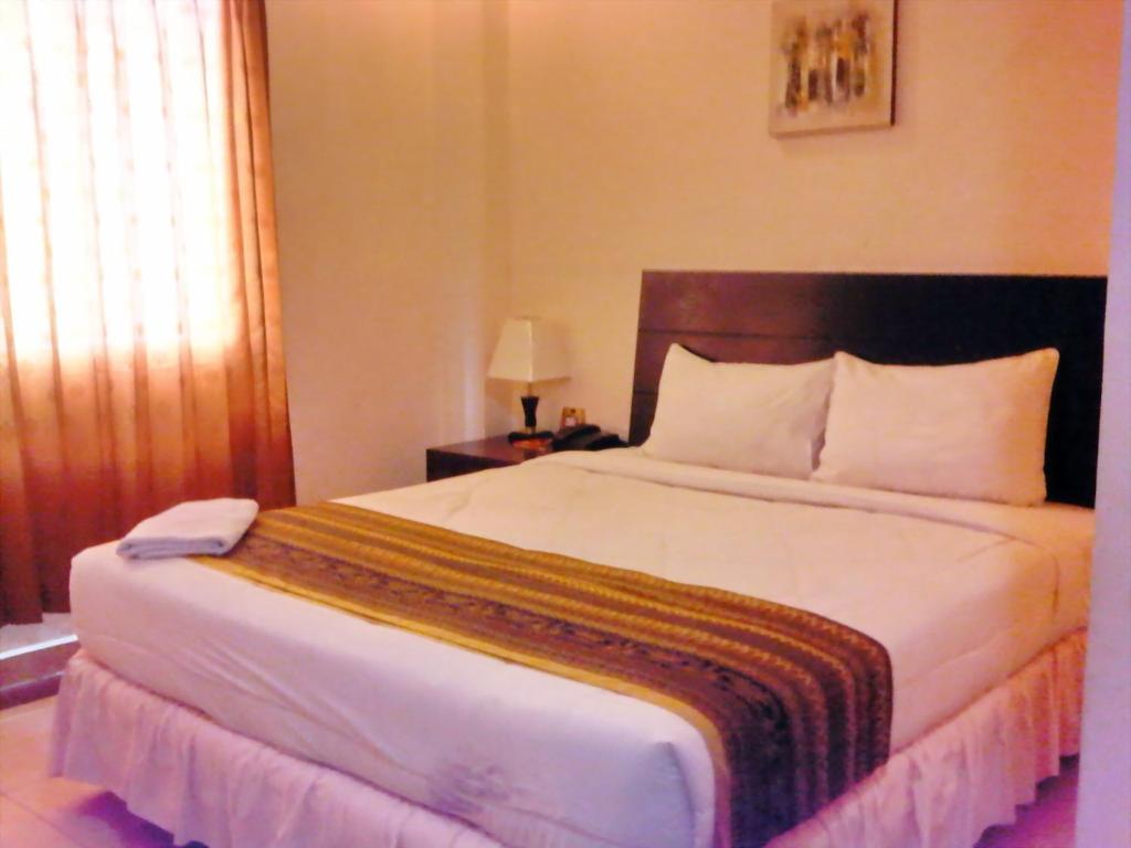 Grand Duta Hotel Palu Rom bilde
